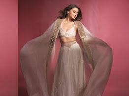 ফ্যাশন ট্রেন্ডে আলিয়া ভাটের লেহেঙ্গা Woman in flowing white attire.